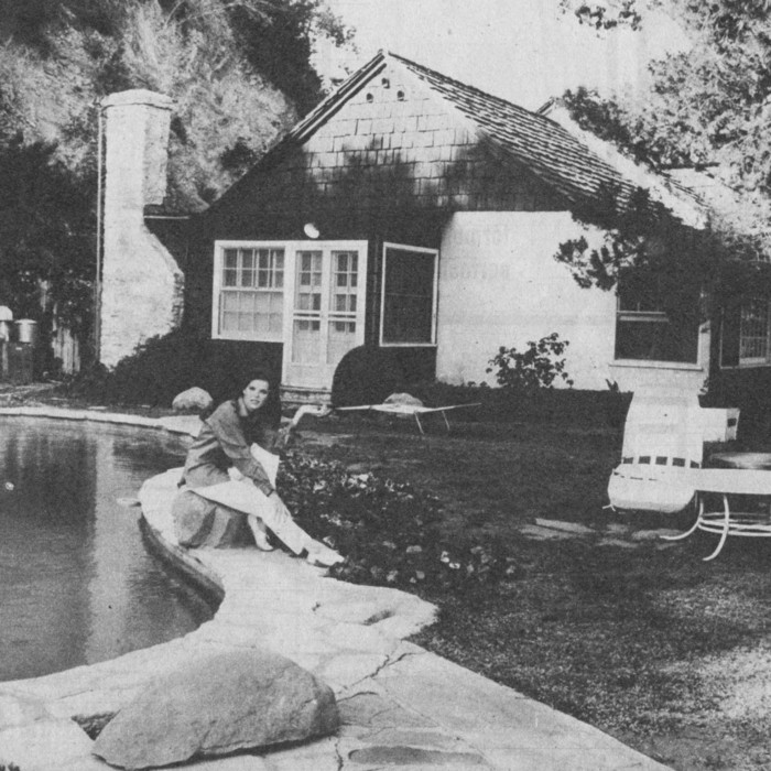 1966 photograph of actress Samantha Egger next to the pool.