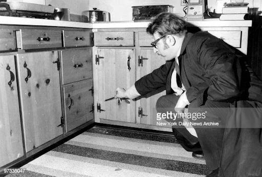 Police examine the kitchen and find a bullet hole in the lower kitchen cabinets, possibly the one that killed Helen List. 